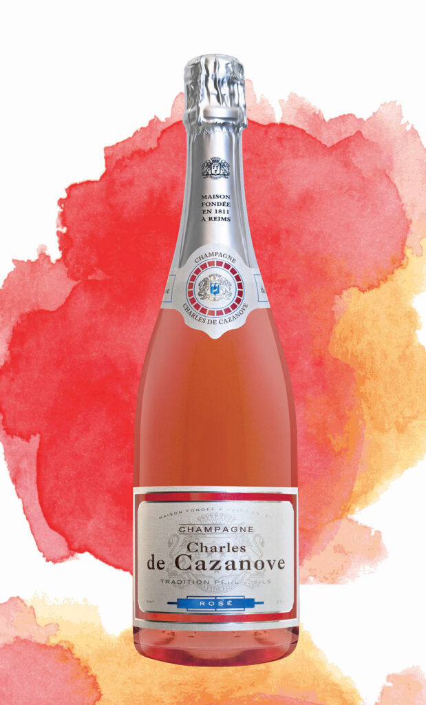 bouteille de champagne rosé Charles de Cazanove sur fond rose / bottle of Charles de Cazanove rosé champagne with a pink background